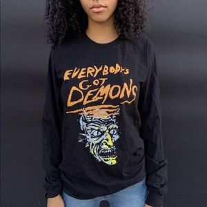 Everybody’s got demons HOT LAVA long leave shirt.